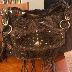 Carlos Santana purse
